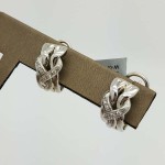 18K	White Gold	9.9	g	Tribal Braided Design			4-prong Set	Round	Diamond		Huggie	Earrings	0.15	ct