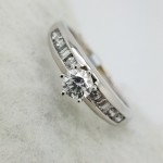 14K	White Gold	Channel band classic engagement	0.60	ct.	R+B	Cut	Diamond	J	I2
