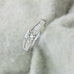 18K	White Gold	Cathedral	.5 + .25	ct.	R,B	Cut	Diamond	J-K	SI2	4-prong / Chanel setting	Solitaire with Accents	Engagement-Ring