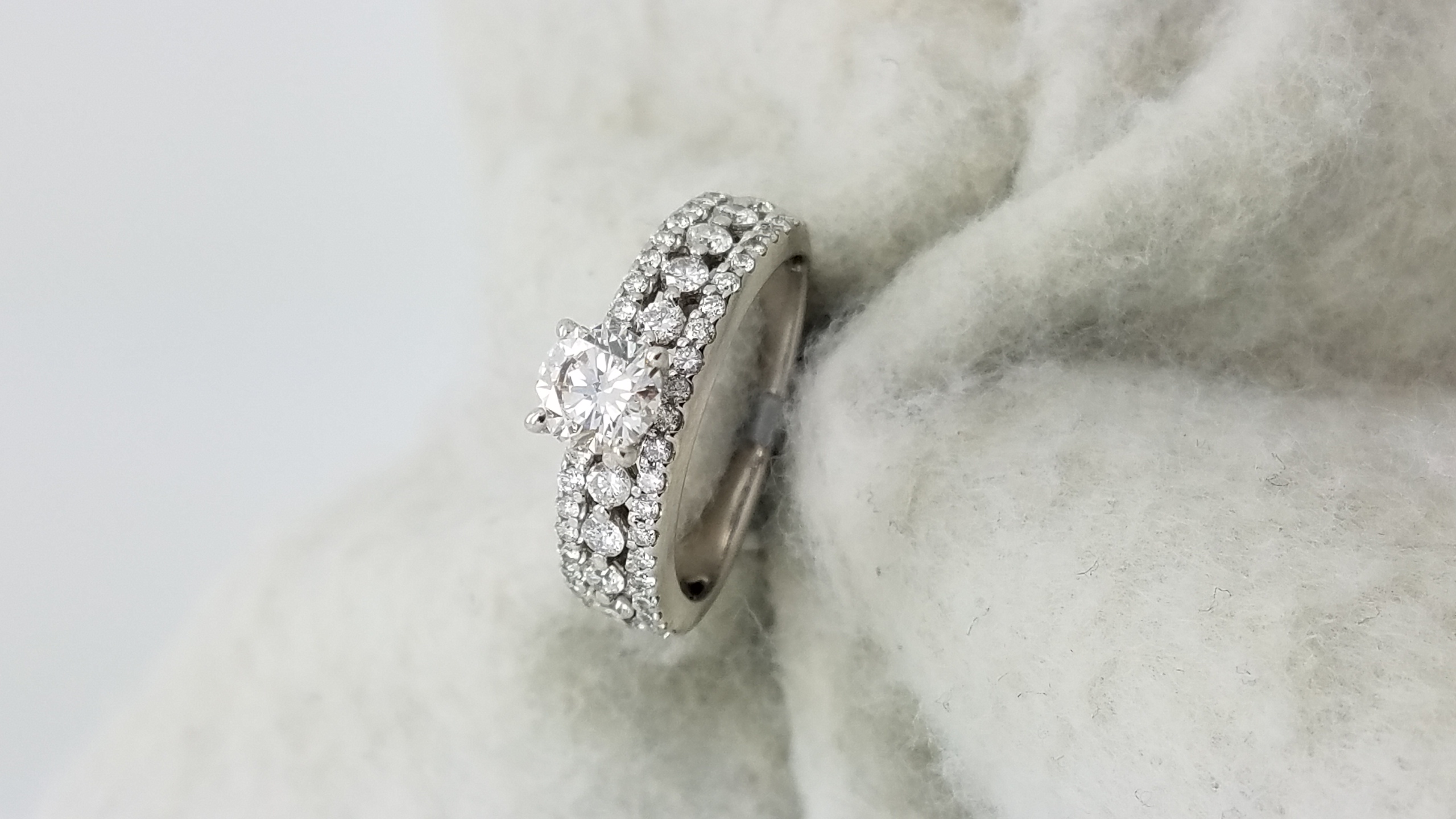 14K	White Gold	Lace style mounting	.57 + .65	ct.	R	Cut	Diamond	H	VS2	4-prong/pave	Solitaire with Accents	Engagement-Ring